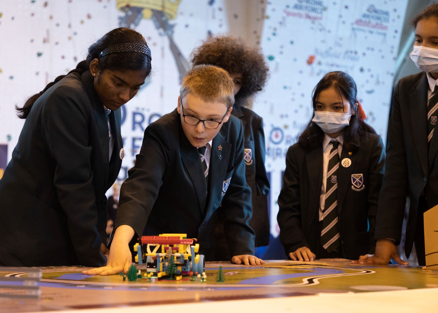 School children make models.